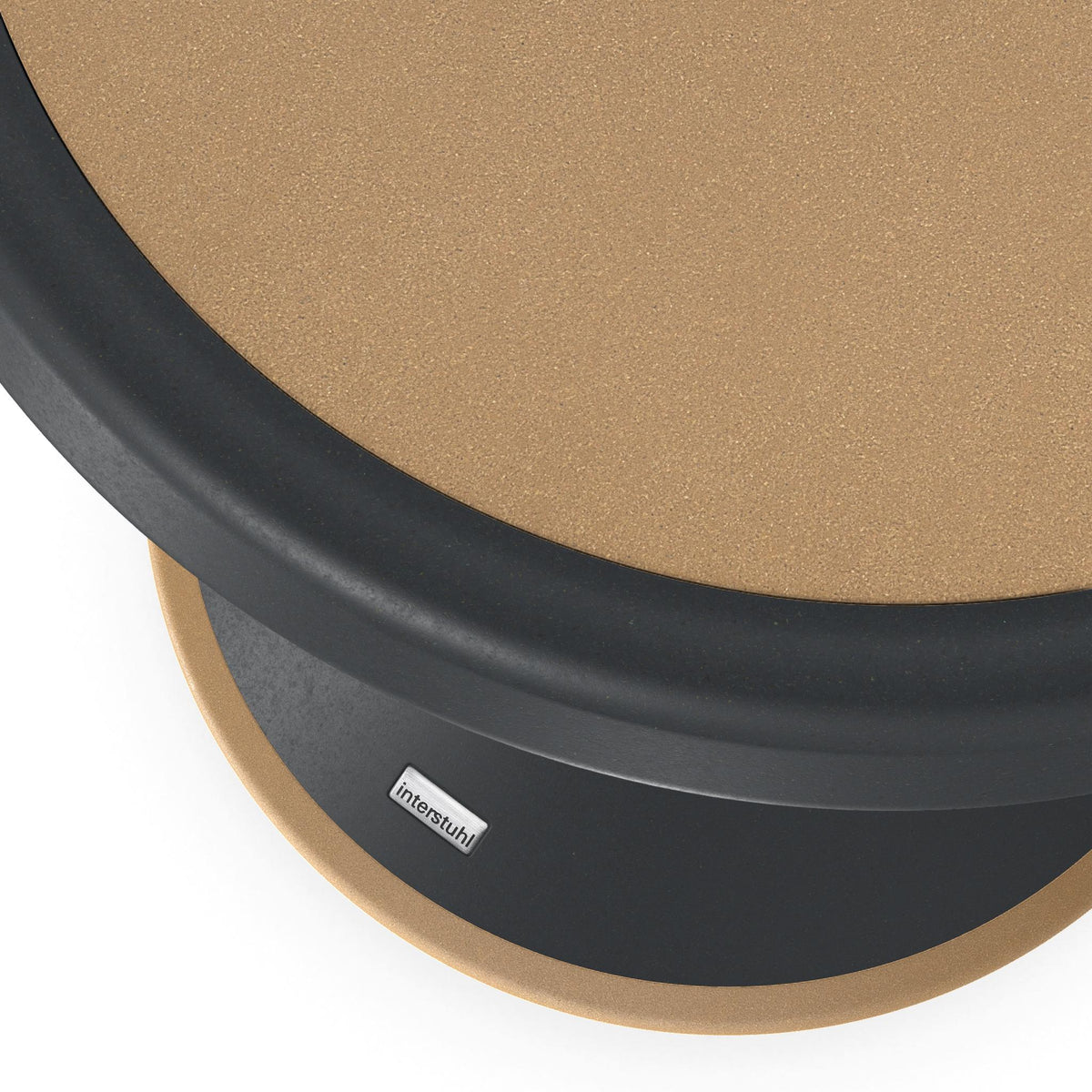 Detail of the cork seat surface and black rim of the Upis 101 ECO UP stool