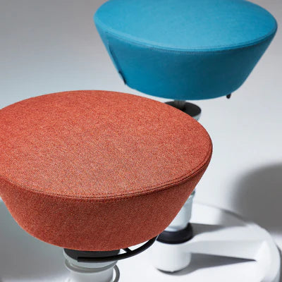 Two Swopper seats in coral and turquoise shown for the design your own Swopper option