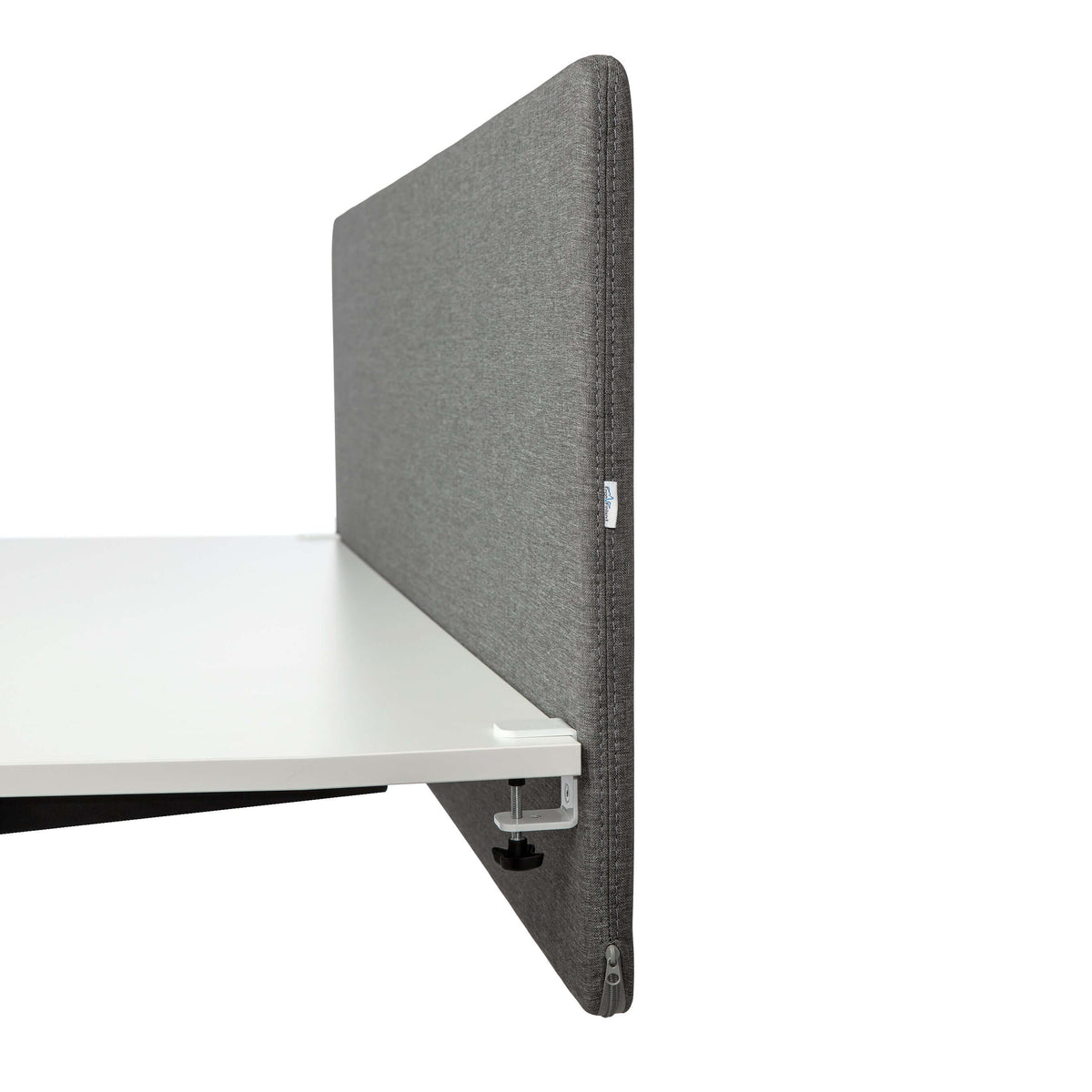 Grey MUTE acoustic screen mounted on a white desk top, viewed from above
