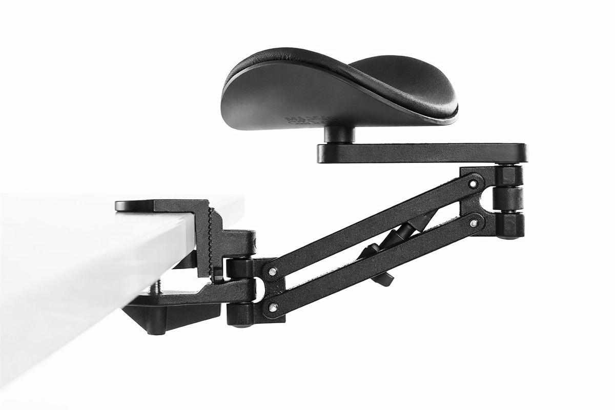 Ergorest 330 black arm support with padded rest on an articulated desk-mounted arm
