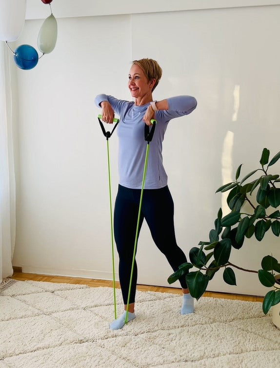 Woman performing a stretching exercise during a work break