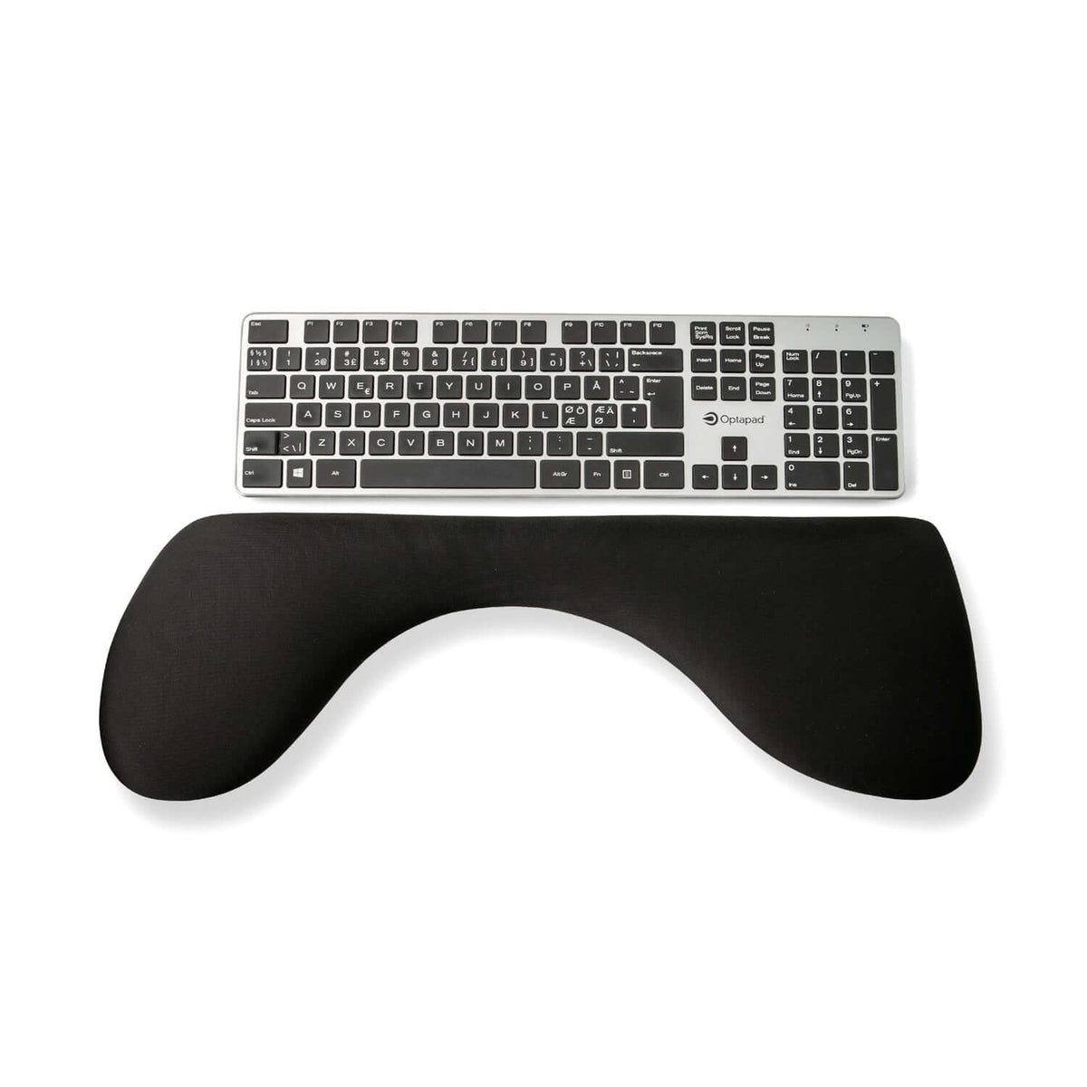 Arm support small positioned in front of a keyboard