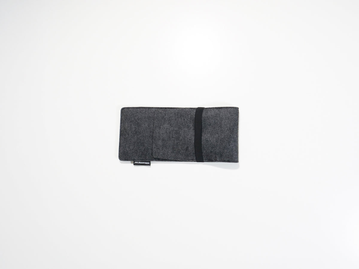 Grey felt laptop sleeve viewed from the front edge