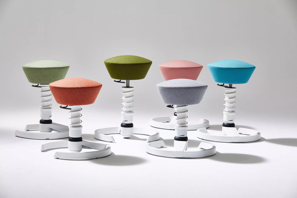 Row of Swopper active chairs in several seat colours