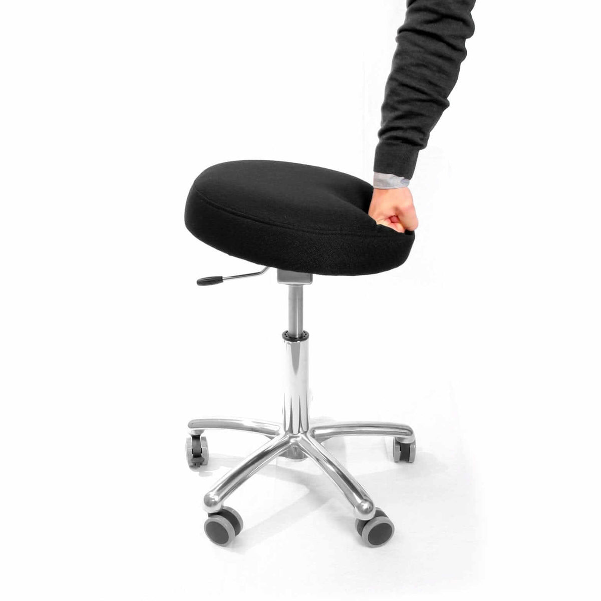 Active Balance 360 active chair shown with a hand adjusting the height lever