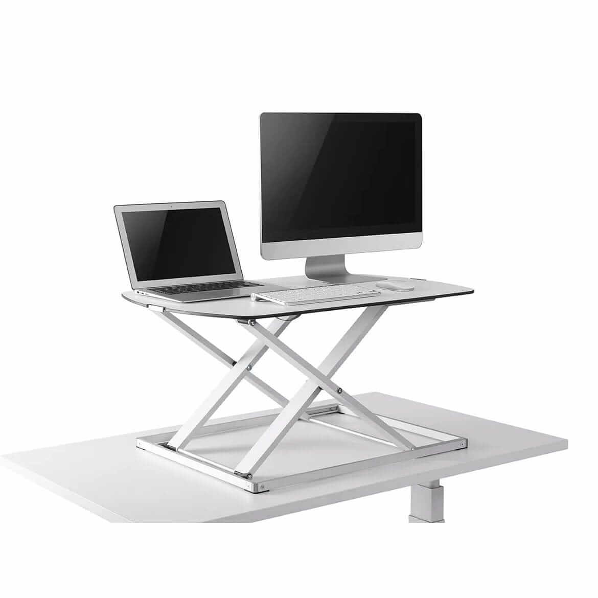 GetUpDesk Free tabletop raised with a laptop and monitor on top