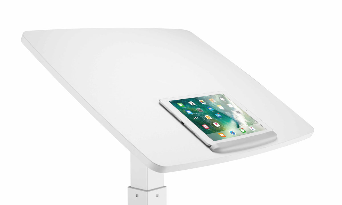 Close-up of the tilting white desk top with a tablet resting on it