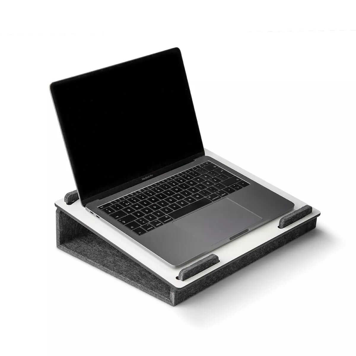 Lapsteri laptop stand holding an open laptop, viewed from the front