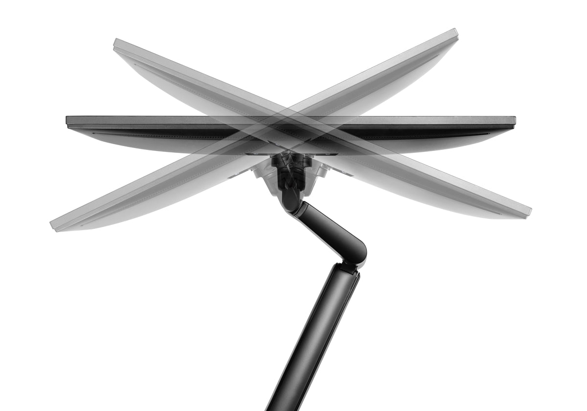 Close-up of the VESA mounting plate on the black monitor arm