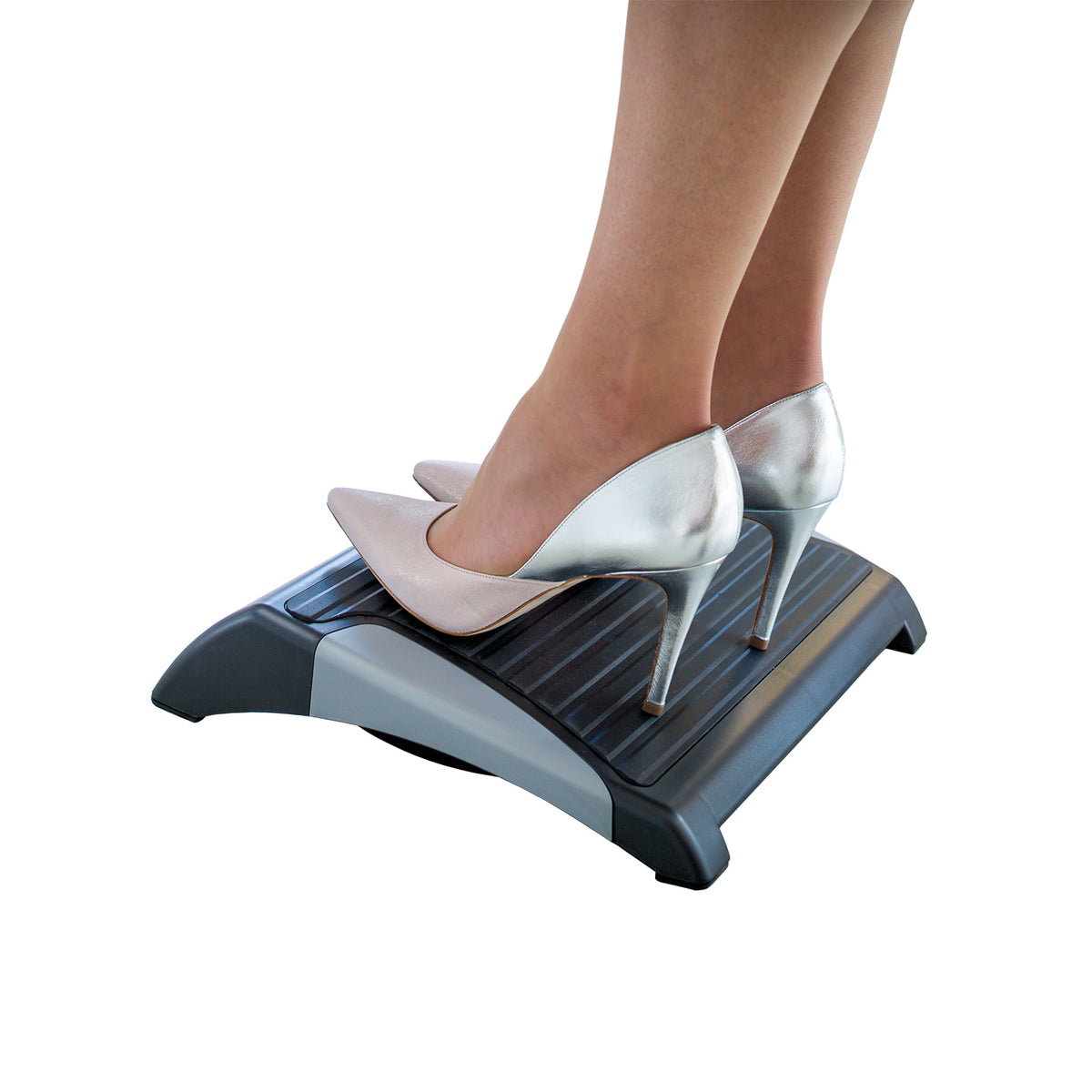 Feet resting on an adjustable Ergo Basic foot support