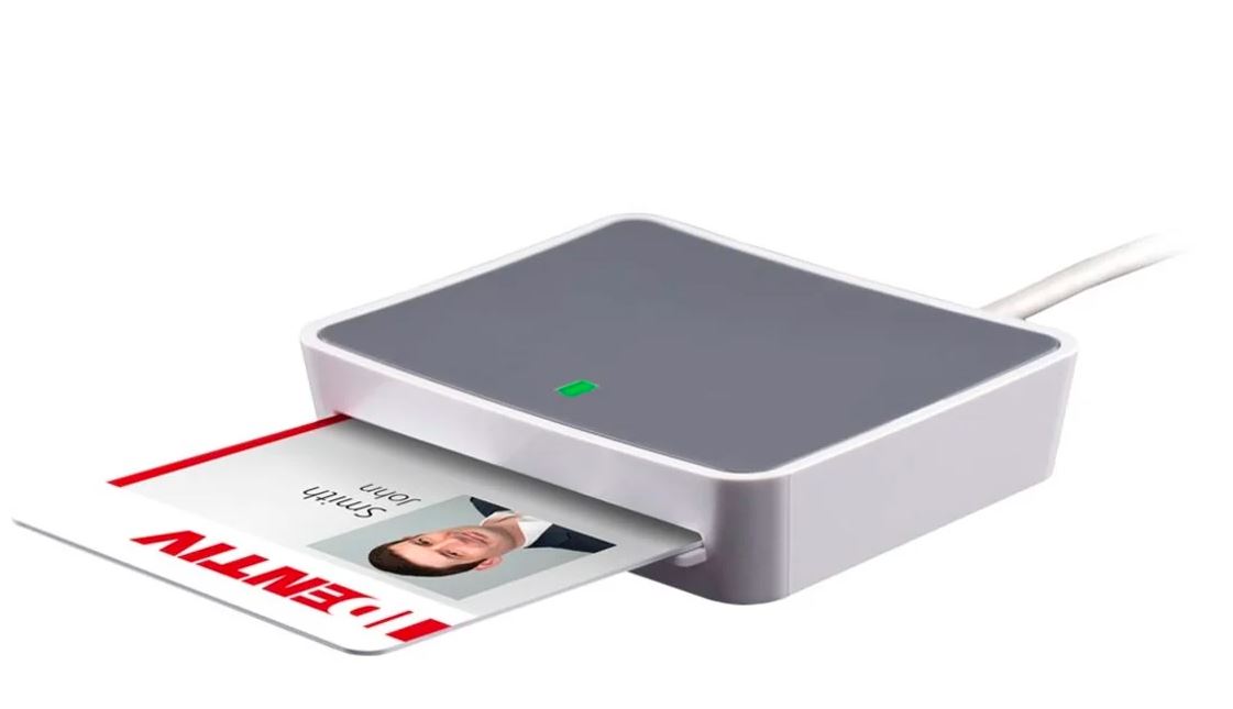 White USB smart card reader with a card inserted in the slot