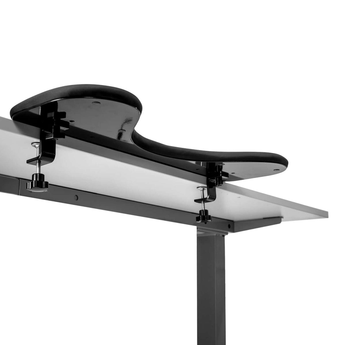 Arm support symmetric shown clamped to the edge of a desk