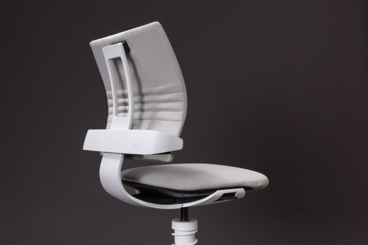 3Dee active chair shown from the front against a dark background, seat and backrest in grey