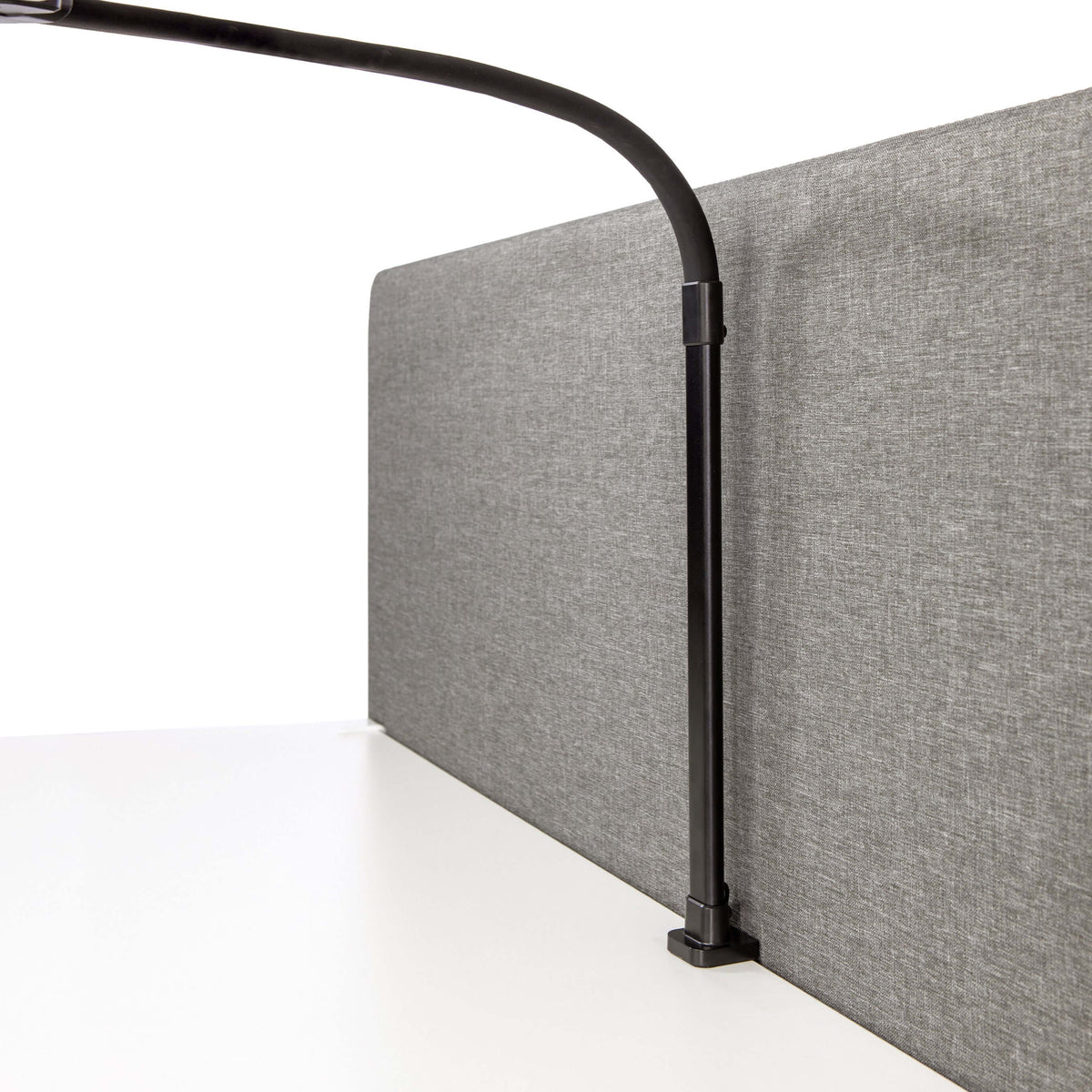 Black DUO LED desk lamp mounted on an office partition, showcasing adjustable light head for flexible workspace illumination.