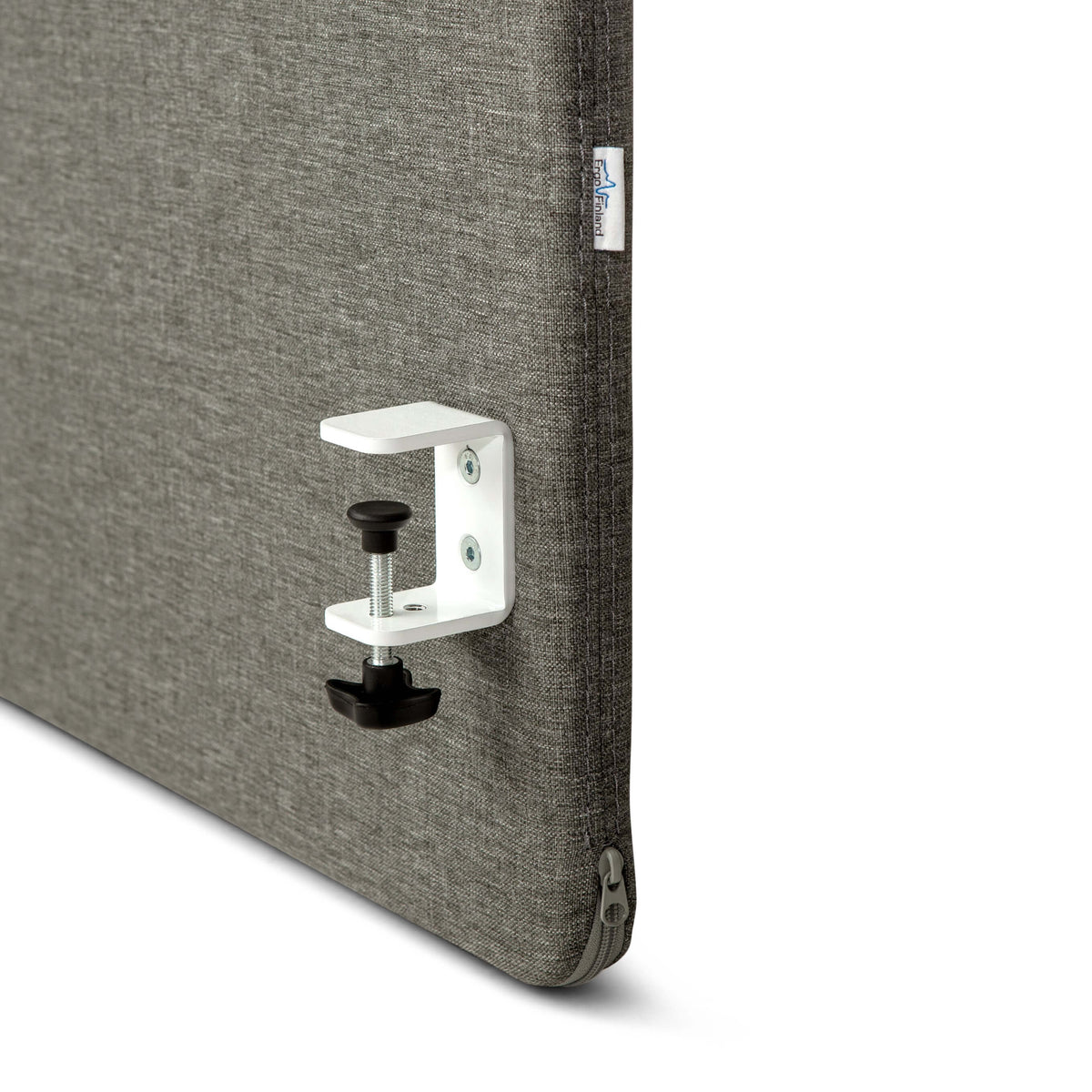 Close-up of the white clamp fixing a grey MUTE acoustic screen to a desk