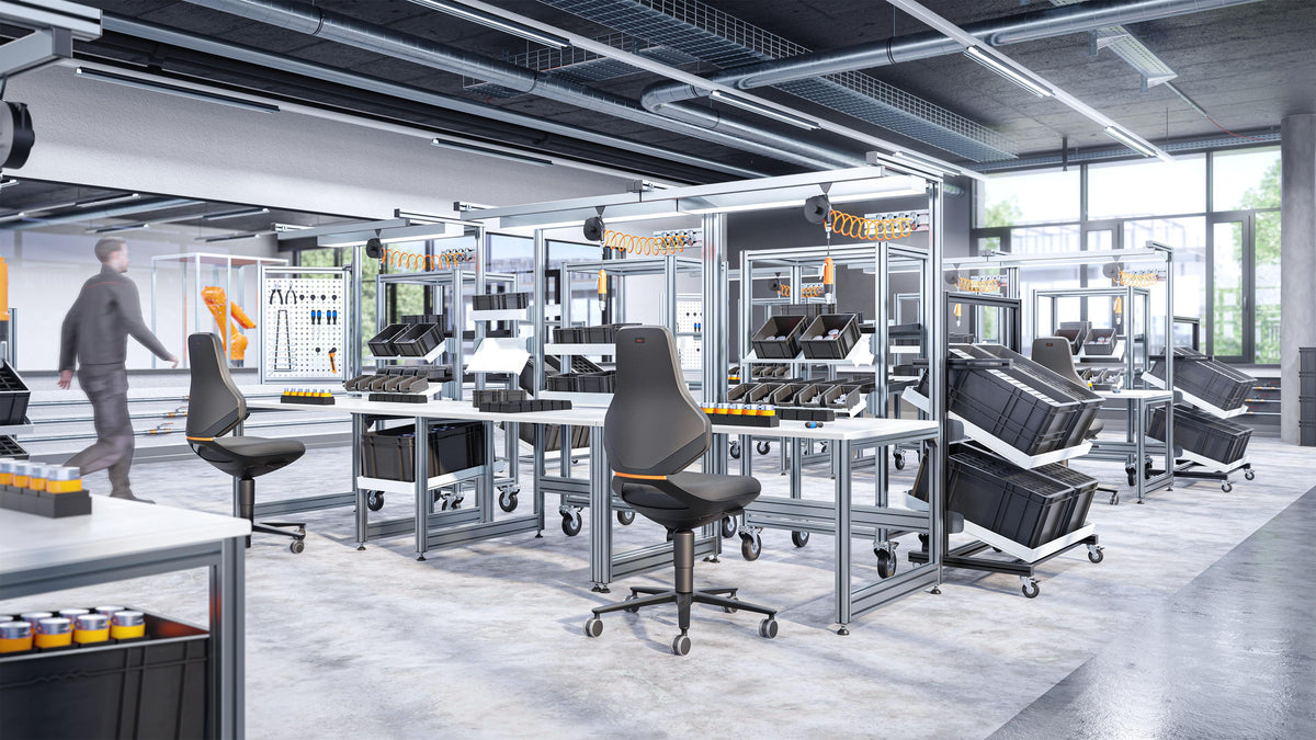 Production hall with Texon work chairs at assembly benches
