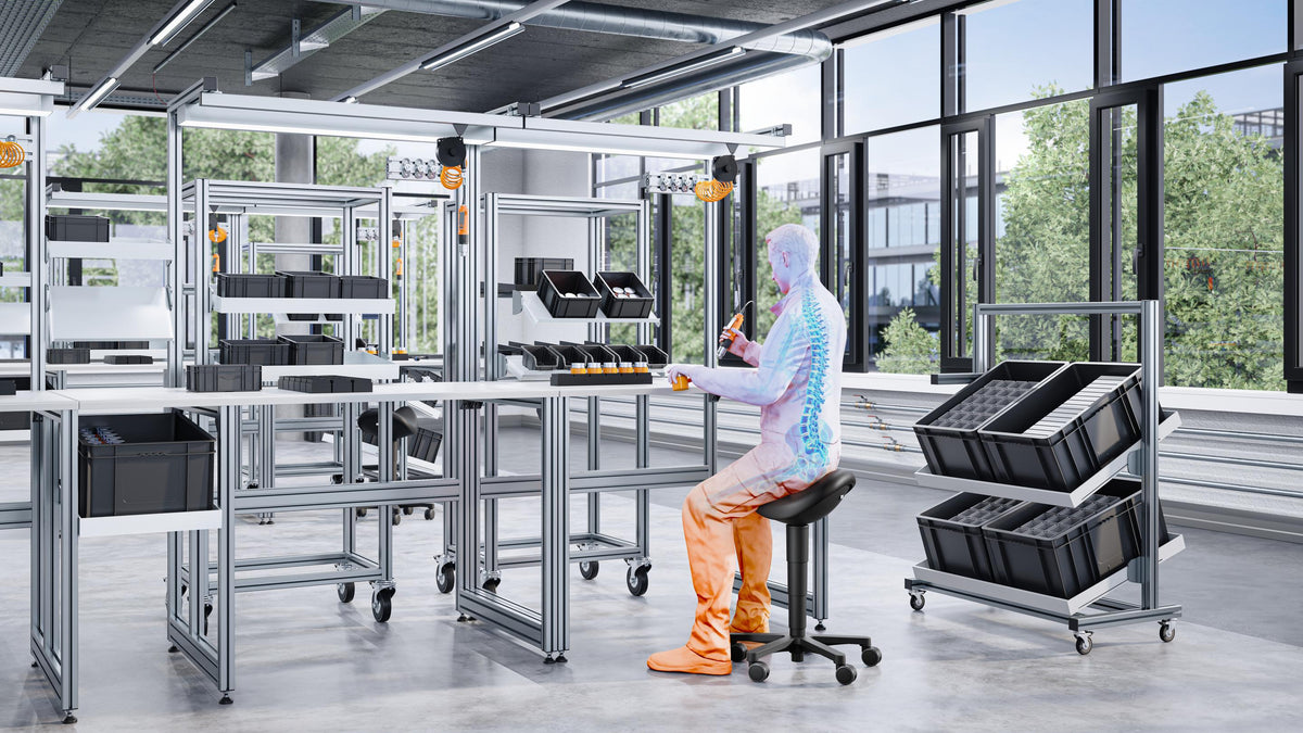 Visualisation of a laboratory with black saddle chairs at workstations