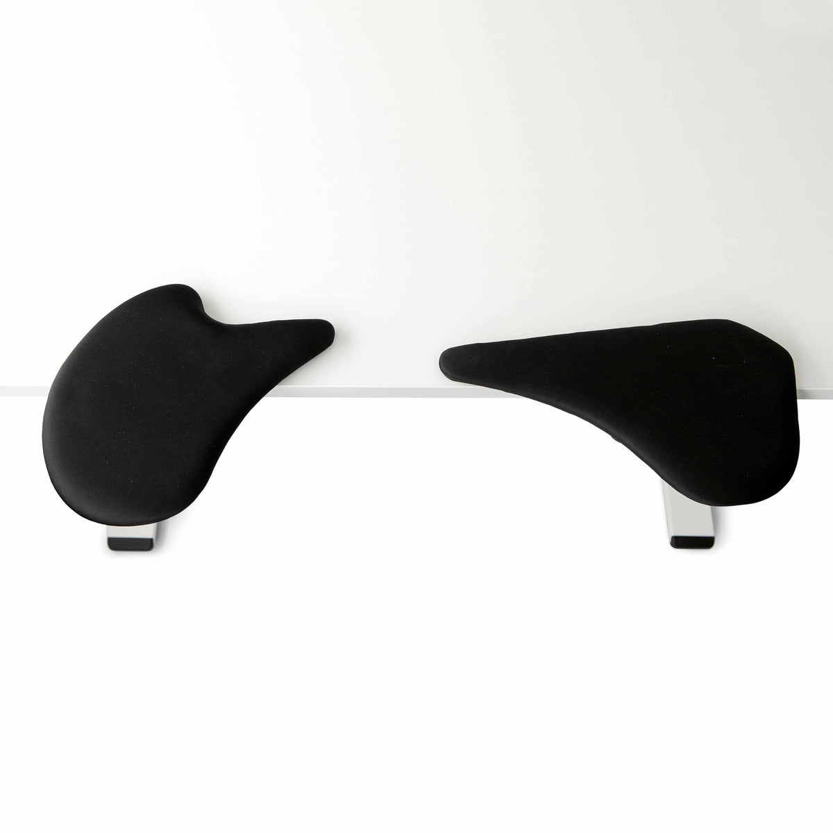 Lycra fabric two-part arm support with adjustable width for ergonomic comfort displayed on a white surface.