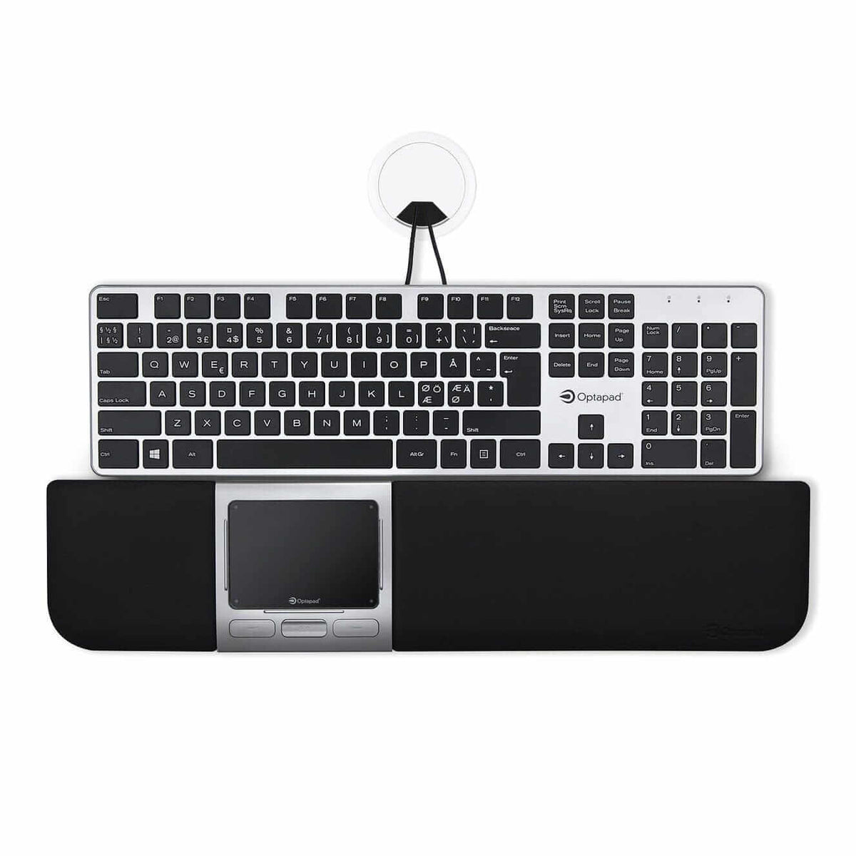 Extended central mouse positioned in front of a keyboard