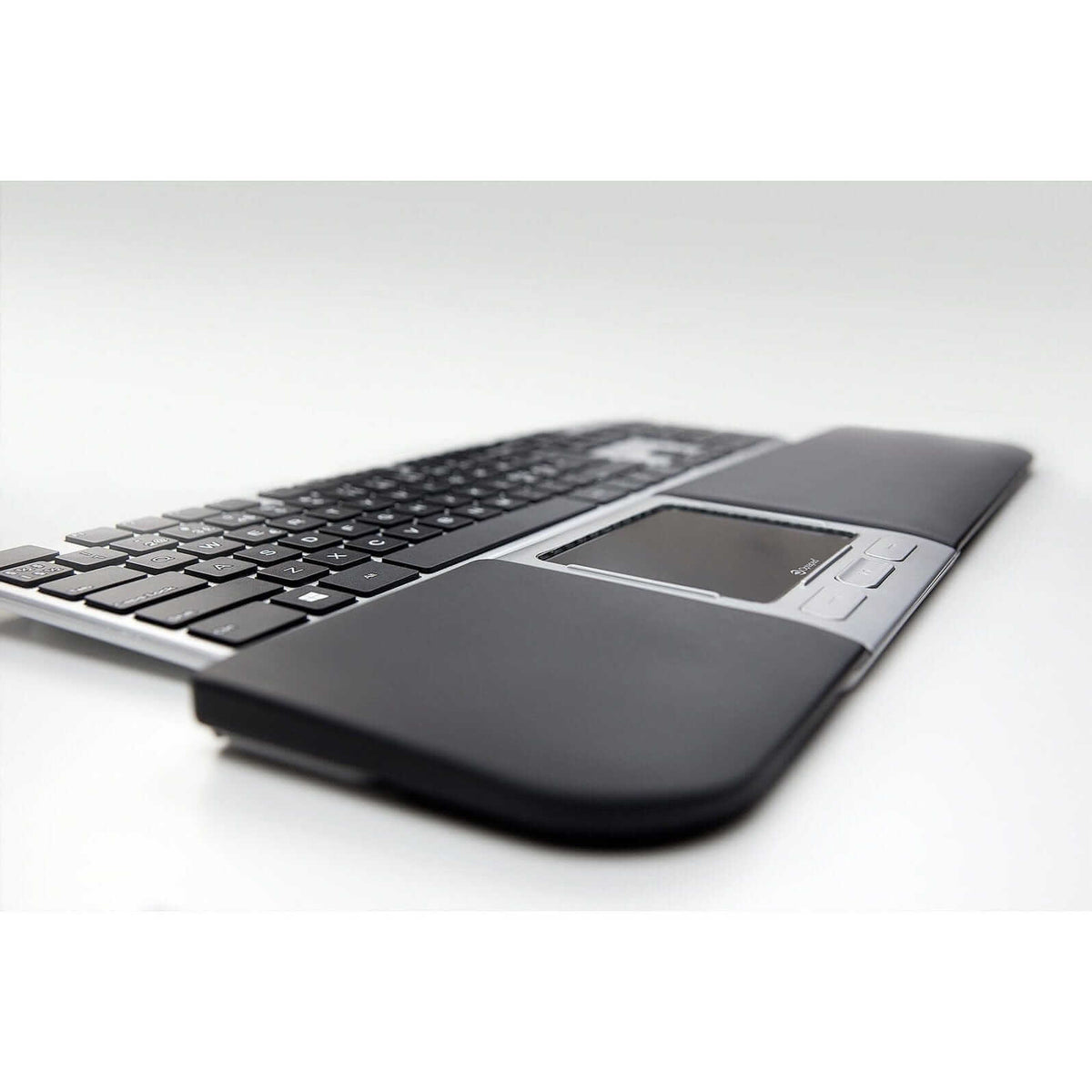 Extended central mouse viewed from the side, showing the wrist rest