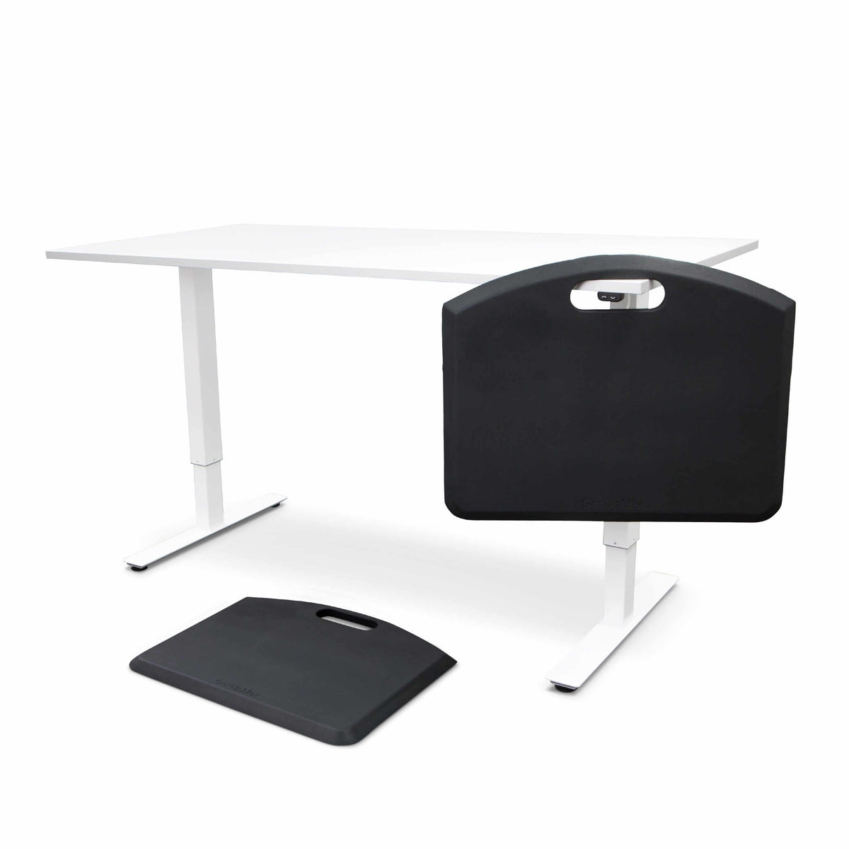 GetUpMat workstation mat with carrying handle in grey, positioned next to a white desk, ergonomic design for standing comfort.