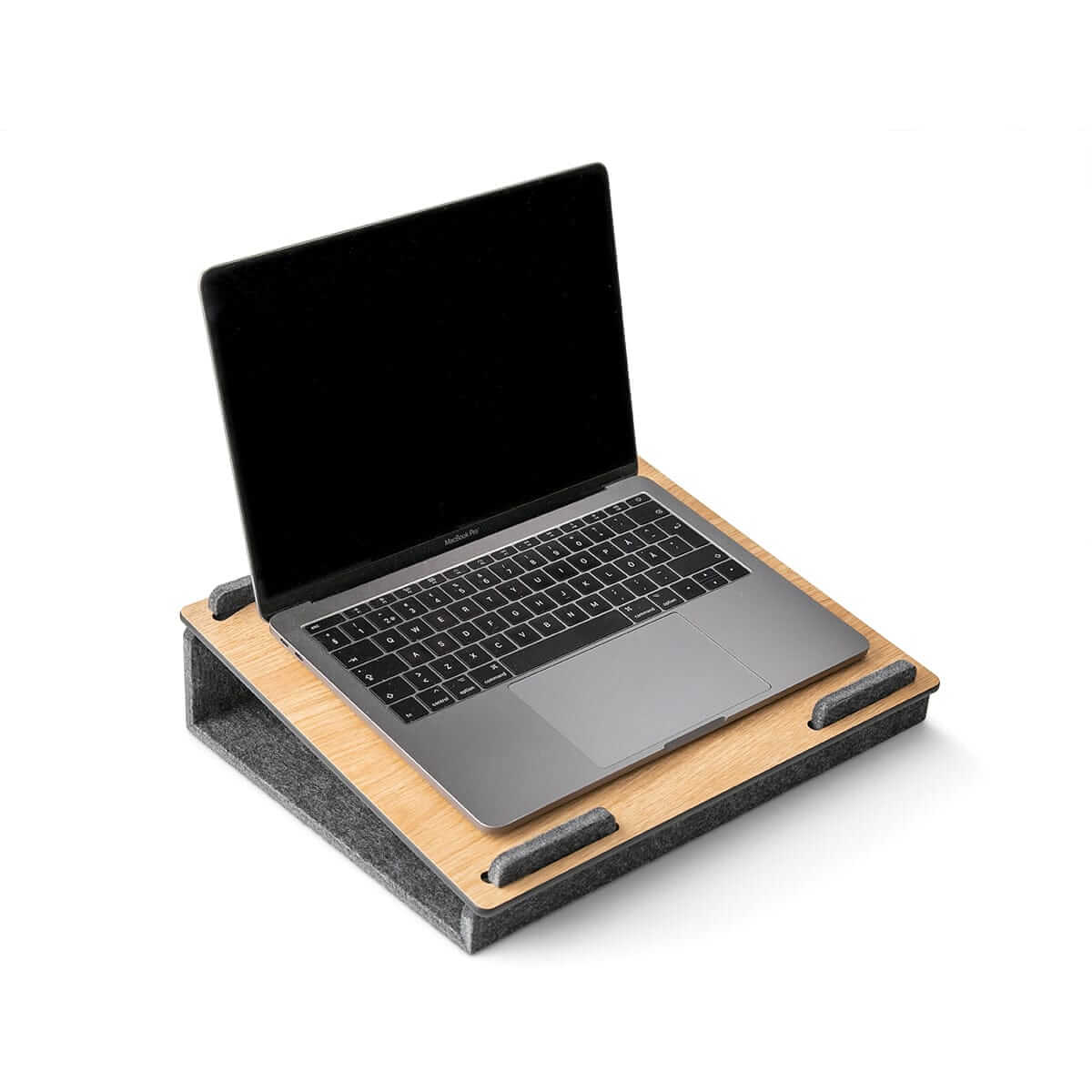 Lapsteri oak laptop stand holding an open laptop